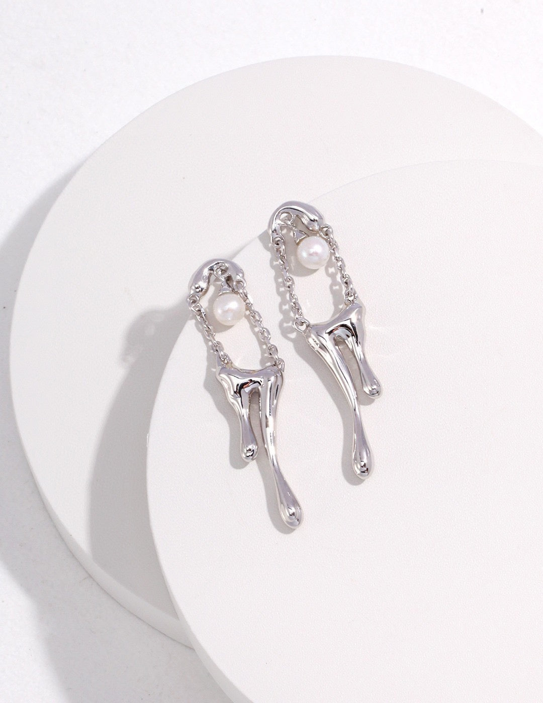 The Morphology of Running Water Earrings